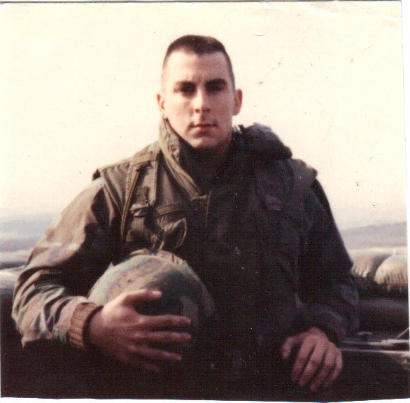 Mark Sauter holding his helmet at Guard Post Collier